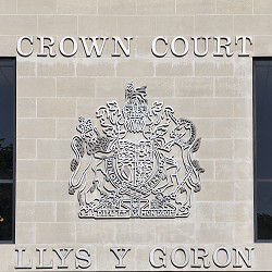 Swansea, Wales, UK, June 30, 2018 : Swansea Crown Court sign in St Helen's Road which is the highest court of first instance in criminal cases
